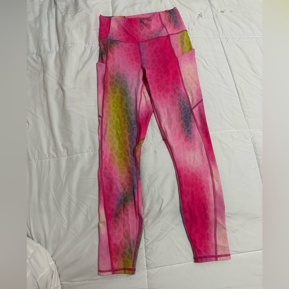 Pink leggings with cheetah print and some other colors
